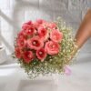Elegant bouquet of blush pink roses symbolizing affection and grace.
