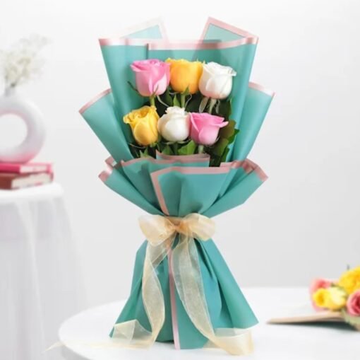 A vibrant bouquet of multicolored roses, beautifully wrapped to symbolize warmth, affection, and heartfelt kisses.