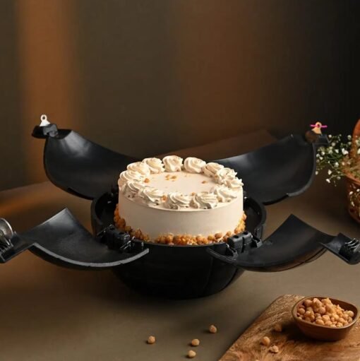 Butterscotch cake topped with caramel drizzle and crunchy nuts for celebrations.
