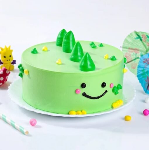 Tropical mermaid-themed cake decorated with sea shells, palm leaves, ocean waves, and colorful mermaid tails.