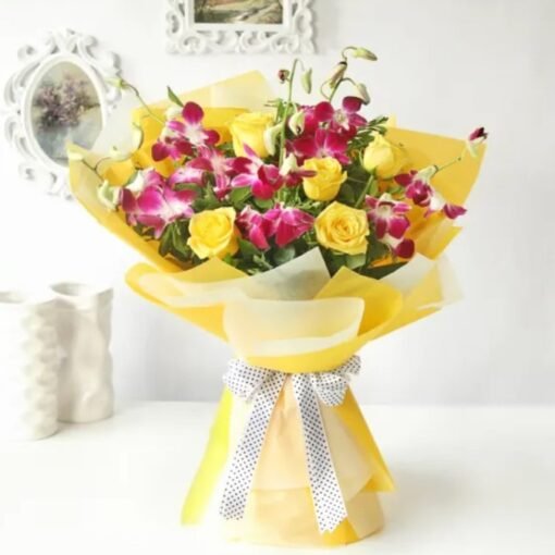 A stunning arrangement of fresh orchids and roses, exuding grace, beauty, and sophistication.