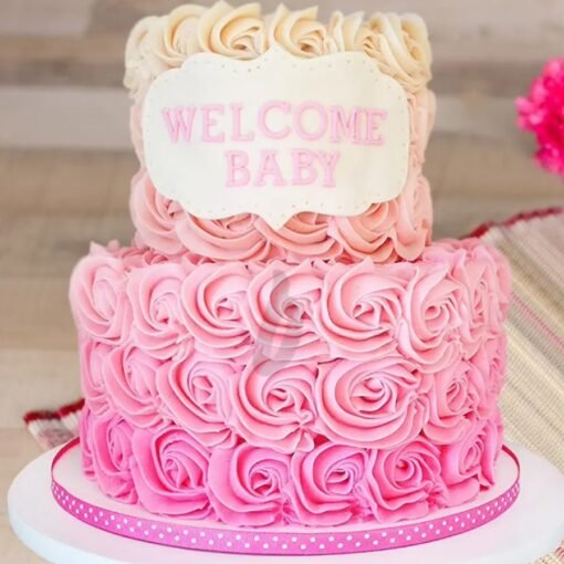 Little Miracle Tier Cake with pastel baby-themed decorations and elegant tiers for baby shower.