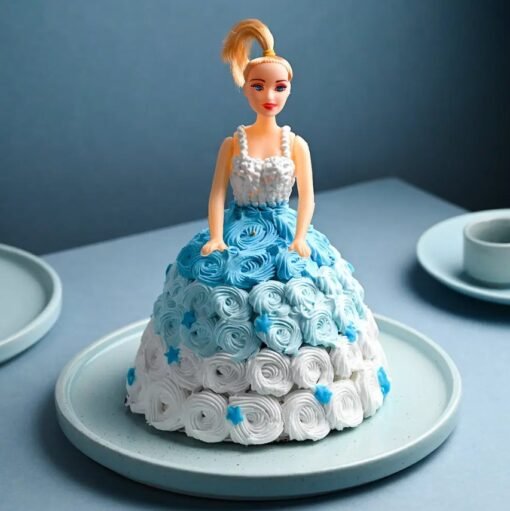 Barbie doll cake with a flowing blue gown made of icing, perfect for birthday celebrations.