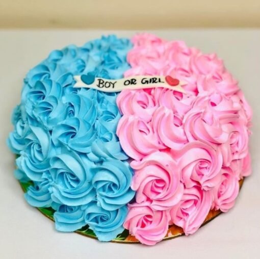Adorable baby-themed cake with pastel colors and cute details, perfect for baby showers and celebrations.