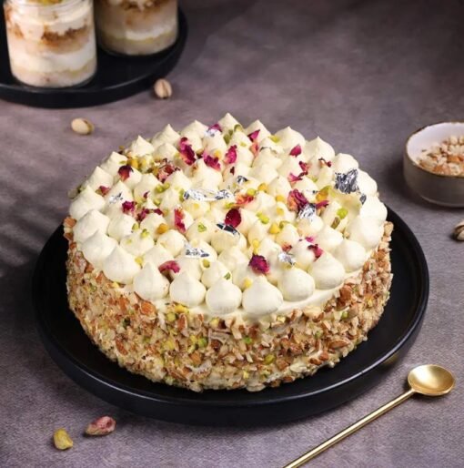 A colorful Holi-themed cake infused with Thandai flavor and decorated with splashes of edible colors and festive designs.