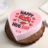 Heart-shaped Hug Day cake with red and white icing, perfect for Valentine’s Week celebrations.