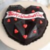 Valentine’s Day heart-shaped pinata cake with “Happy Valentine’s Day” message and hidden treats inside.