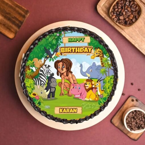 Mowgli Ke Dost Cake with jungle animals and forest-themed decorations.