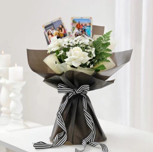 Elegant rose bouquet with rich red and pink blooms wrapped stylishly, symbolizing magnetic charm and romantic affection.