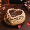 Romantic heart-shaped chocolate truffle cake with rich, luscious layers.