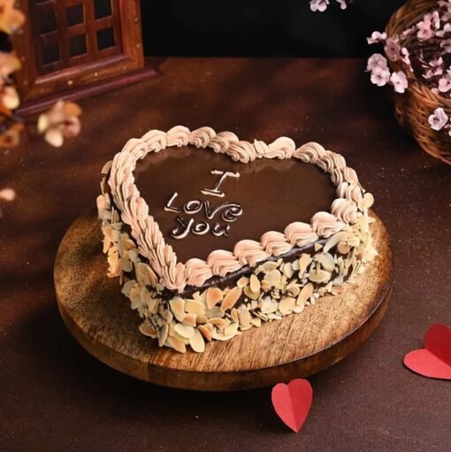 Romantic heart-shaped chocolate truffle cake with rich, luscious layers.