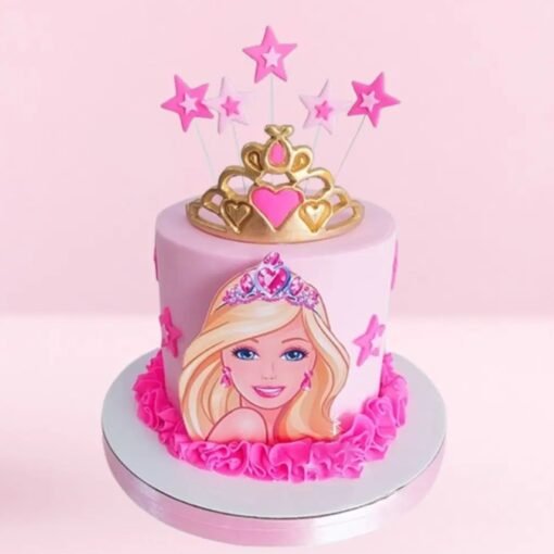 Barbie queen-themed cake with crown, royal gown details, and elegant decorations in gold and pink.