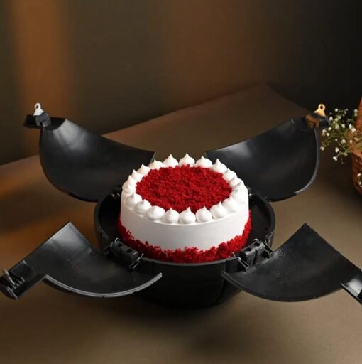 Red velvet bomb cake with a heart shell and surprise treats inside.