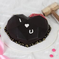 I Love You Pinata Cake with heart design and hidden chocolate treats inside.