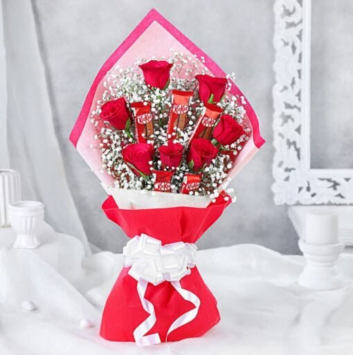 Red roses bouquet with assorted chocolates arranged beautifully as a gift combo.