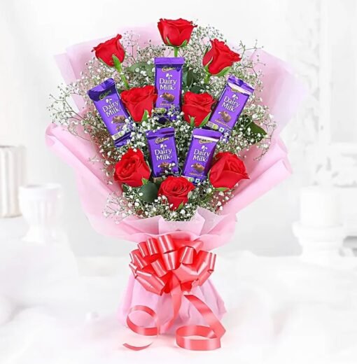 Bouquet of red roses paired with Dairy Milk chocolate bars – perfect for gifting and celebrations.