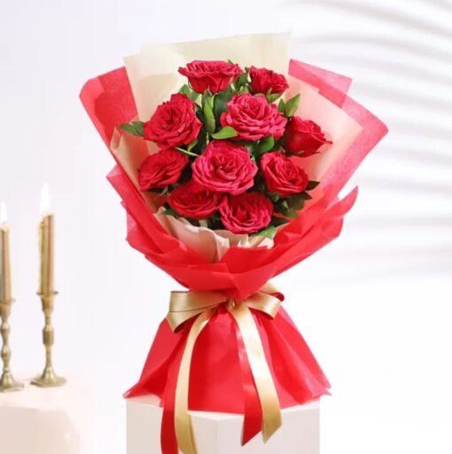 A stunning bouquet of deep red roses arranged elegantly, representing a heartfelt crimson love story.