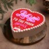 Beautiful heart-shaped cake decorated with vibrant colors and joyful designs.