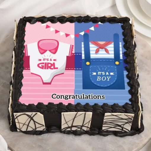 He or She Delight gender reveal cake with pink and blue decorations.