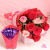 Combo of red roses and chocolates arranged beautifully, ideal for expressing love on special occasions like anniversaries or Valentine’s Day.