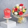 A vibrant arrangement of red roses with assorted chocolates, beautifully presented as a romantic gift combo.