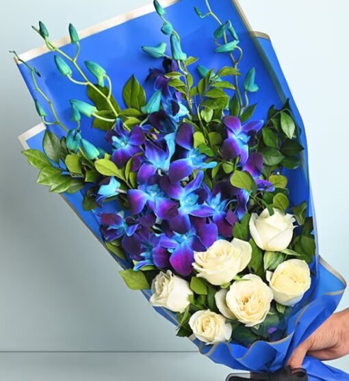 A stunning Orchids and Roses Bouquet featuring delicate orchids and vibrant roses, symbolizing beauty, love, and sophistication for any occasion.