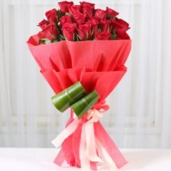 Crimson red roses bouquet symbolizing deep passion and eternal love, wrapped elegantly for a romantic surprise.
