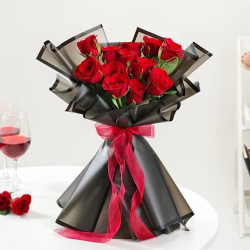 Luxurious bouquet of deep red roses symbolizing passion and romantic love, elegantly wrapped for a timeless gift.