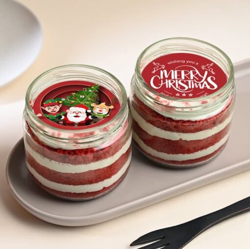 Festive red velvet jar cake decorated for Christmas, ideal for holiday gifting or personal treats.