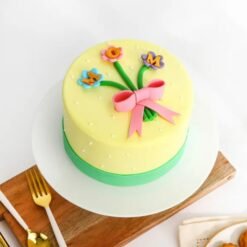 Blooming For You Mother’s Day Cake — beautifully decorated cake with floral accents, perfect for celebrating a special mother.