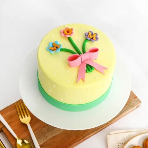 Blooming For You Mother’s Day Cake — beautifully decorated cake with floral accents, perfect for celebrating a special mother.