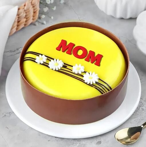 Blooming Mango Mother’s Day Cake — mango-flavored cake adorned with delicate floral decorations, perfect for celebrating Mom.