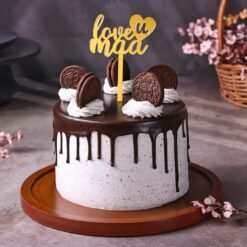 Choco Oreo Mother’s Day Cake — rich chocolate cake topped with Oreo cookies, cream swirls, and festive decorations for Mom.