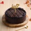 Chocolate Truffle Mother’s Day Cake — rich, glossy chocolate cake with elegant decorations and a heartfelt Mother’s Day message.
