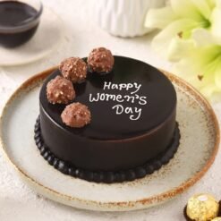 Chocolate Truffle Women’s Day Cake with a luxurious chocolate glaze and elegant decorations, perfect for honoring women’s strength and beauty.