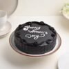 Happy Women’s Day Truffle Cake with a luxurious chocolate glaze and elegant decorations, perfect for honoring women’s strength and beauty.