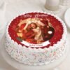 Personalized Merry Moments Photo Cake with festive Christmas decorations.