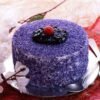 Creamy Blueberry Cake topped with fresh blueberries and smooth whipped cream, ideal for birthdays, parties, or indulgent moments.