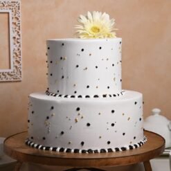 Elegant Glorious Two Tier Cake with exquisite frosting and decorative accents, perfect for weddings, birthdays, and anniversary celebrations.