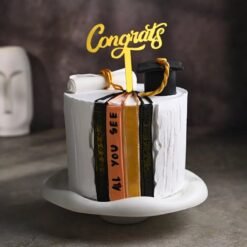 Grand Achievement Graduation Cake with elegant decorations, a graduation cap topper, and celebratory details for a proud academic milestone.