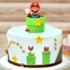 Happy Super Mario Cake — themed fondant cake featuring Mario, stars, mushrooms, and game elements for a fun birthday celebration.