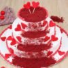 Love Red Velvet Tier Cake with luxurious red layers, creamy frosting, and romantic heart-themed decorations.