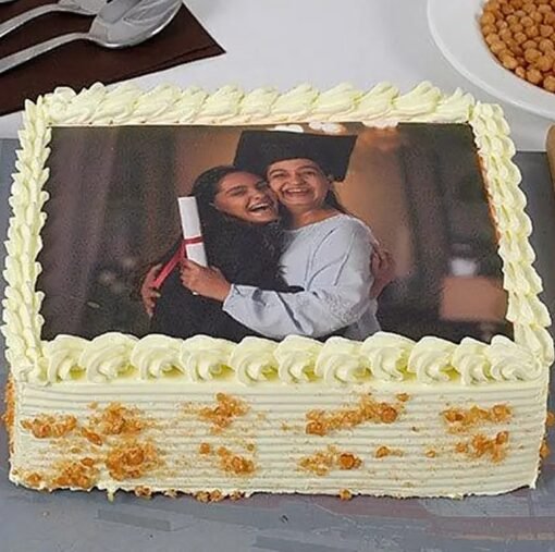 Love You Mom Butterscotch Cake — golden brown cake with decorative text and elegant toppings, perfect for Mother’s Day.
