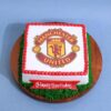Manchester United Cake — red and black cake decorated with club crest, football elements, and Man Utd-themed toppers.