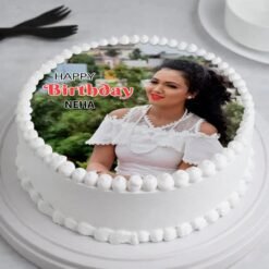 Photo Blast Treat Cake with customized photo toppers, colorful decorations, and indulgent layers of rich cream and cake.