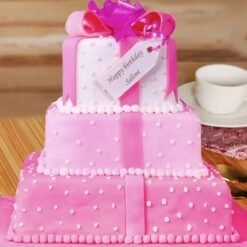 Pink Gifts Tier Cake with decorative fondant gift boxes, floral accents, and pastel hues for birthdays, anniversaries, and celebrations.