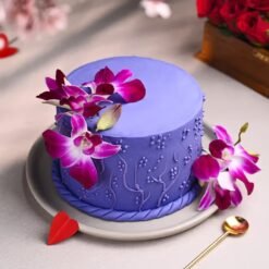 Purple Graceful Blossoms Cake – a beautifully decorated floral cake with shades of purple, perfect for celebrations and special moments.