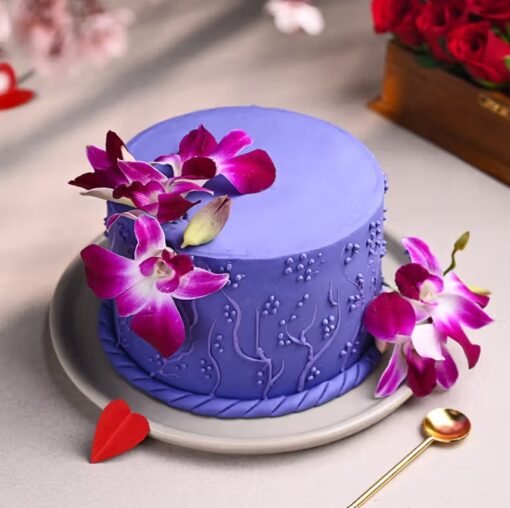 Purple Graceful Blossoms Cake – a beautifully decorated floral cake with shades of purple, perfect for celebrations and special moments.