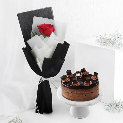 Rose and chocolate ice cream cake combo topped with floral decorations and rich chocolate drizzle.