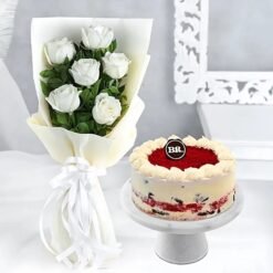 Roses and red velvet ice cream cake combo featuring layers of red velvet and adorned with fresh roses.